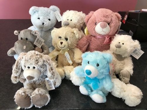 A Bunch of Stuffed Animals Are Sitting on a Table — Bundaberg House of Flowers in Bundaberg West, QLD