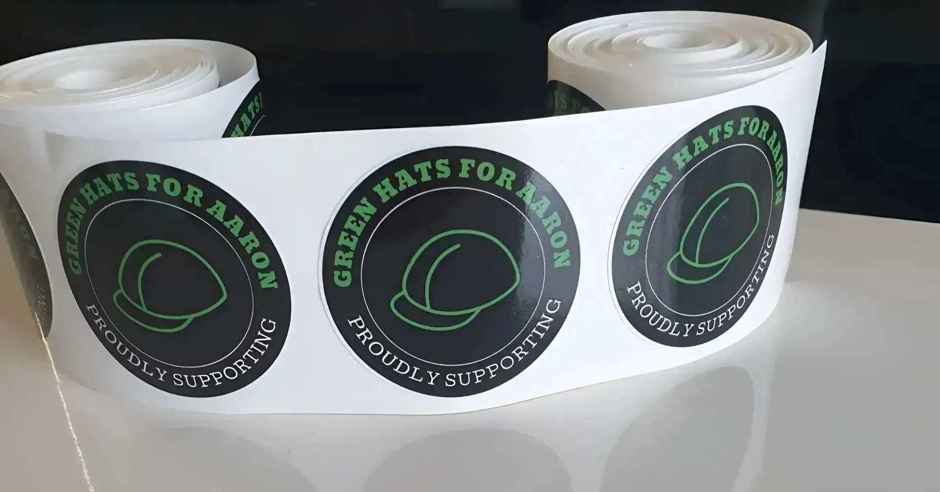 White Branded Paper Cups With Green-and-black Circular Logos — Fresh Print Signs In South Murwillumbah, NSW