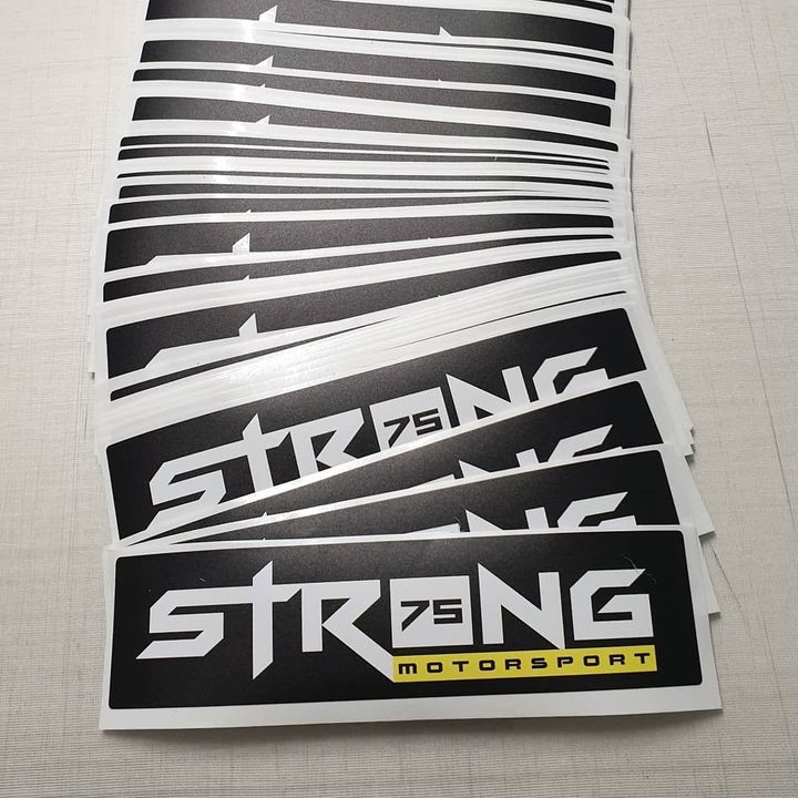 Stack of Black-and-white Strong Motorsport Decals — Fresh Print Signs In South Murwillumbah, NSW