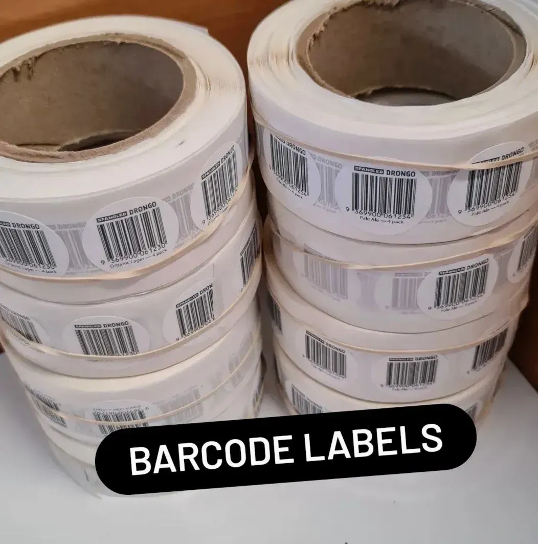 Stacks of White Barcode Label Rolls — Fresh Print Signs In South Murwillumbah, NSW