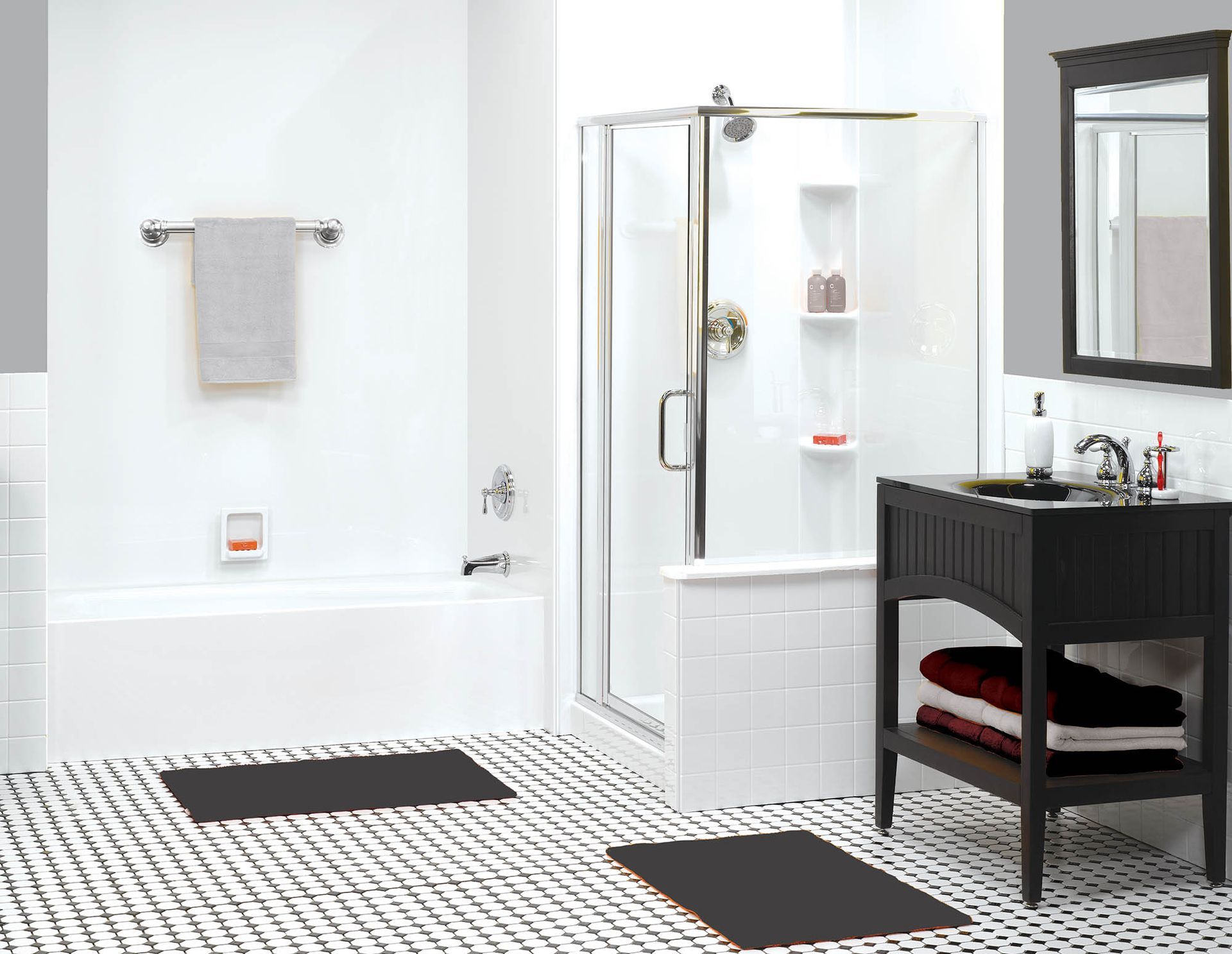 a bathroom with a bathtub , sink , mirror and shower stall .