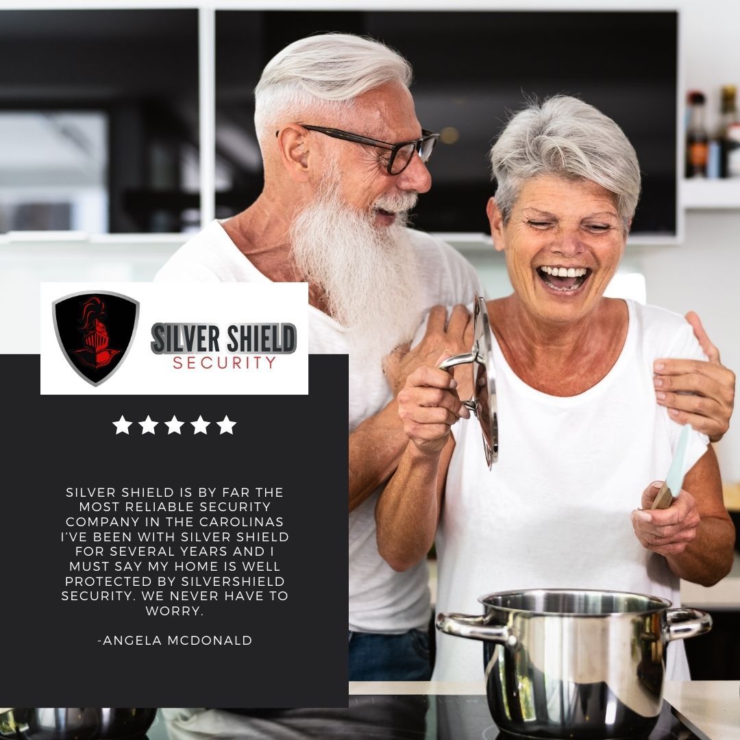 Senior couple cooking in a kitchen beside a Silver Shield Security ad with shield logo and five stars