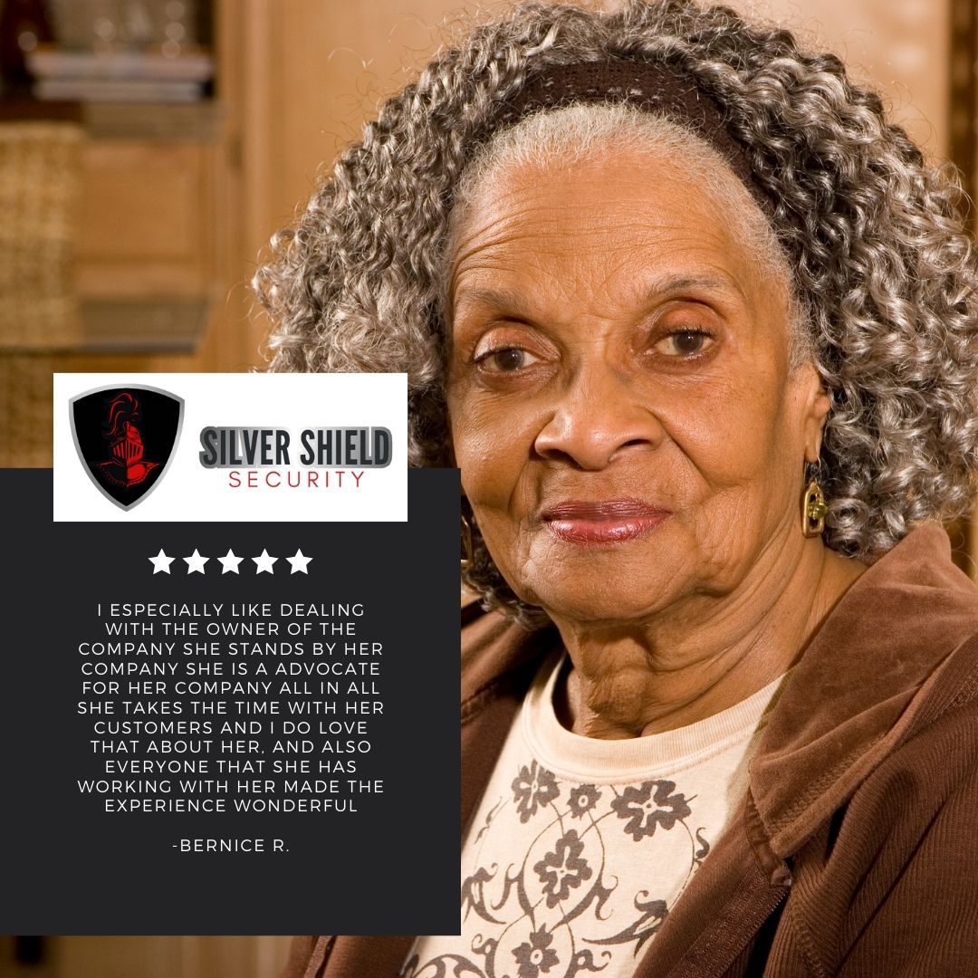 Woman beside Silver Shield Security ad with shield logo and five stars