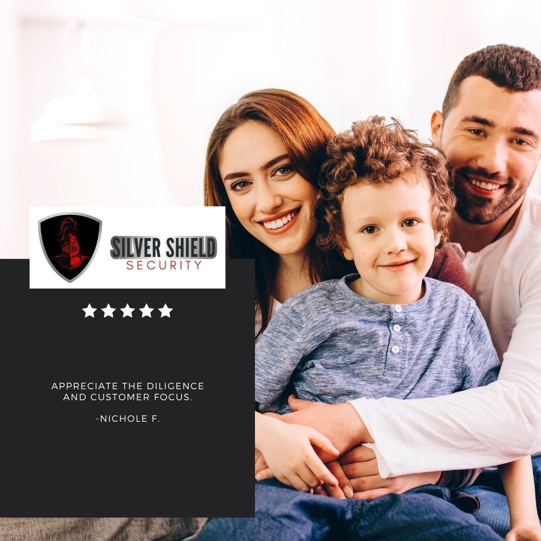 Family smiling beside Silver Shield Security logo on a black panel, with five stars and small text.
