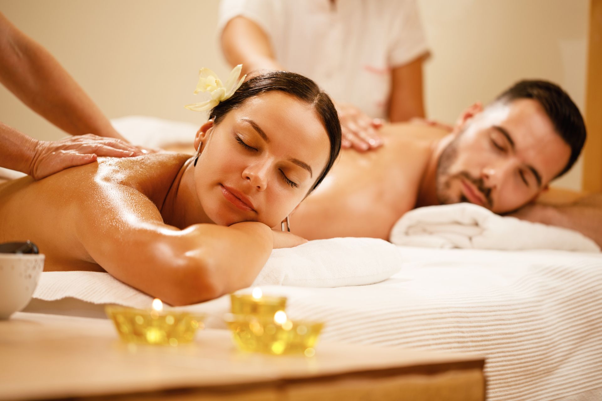 A Man and a Woman Are Getting a Massage in a Spa — Erikka's All Occasion Beauty In Rockhampton City, QLD