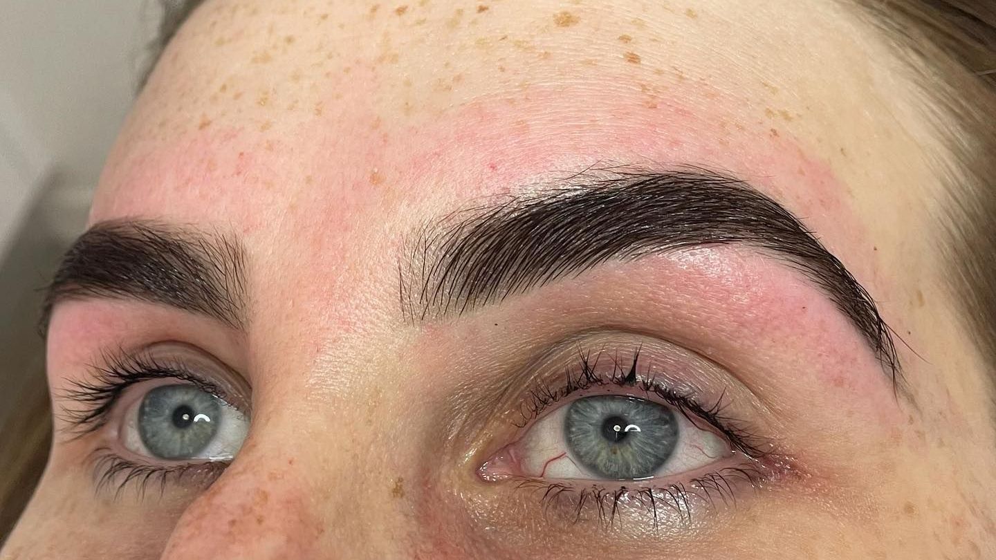 A Close Up of a Woman's Face With Blue Eyes and Black Eyebrows — Erikka's All Occasion Beauty In Rockhampton City, QLD