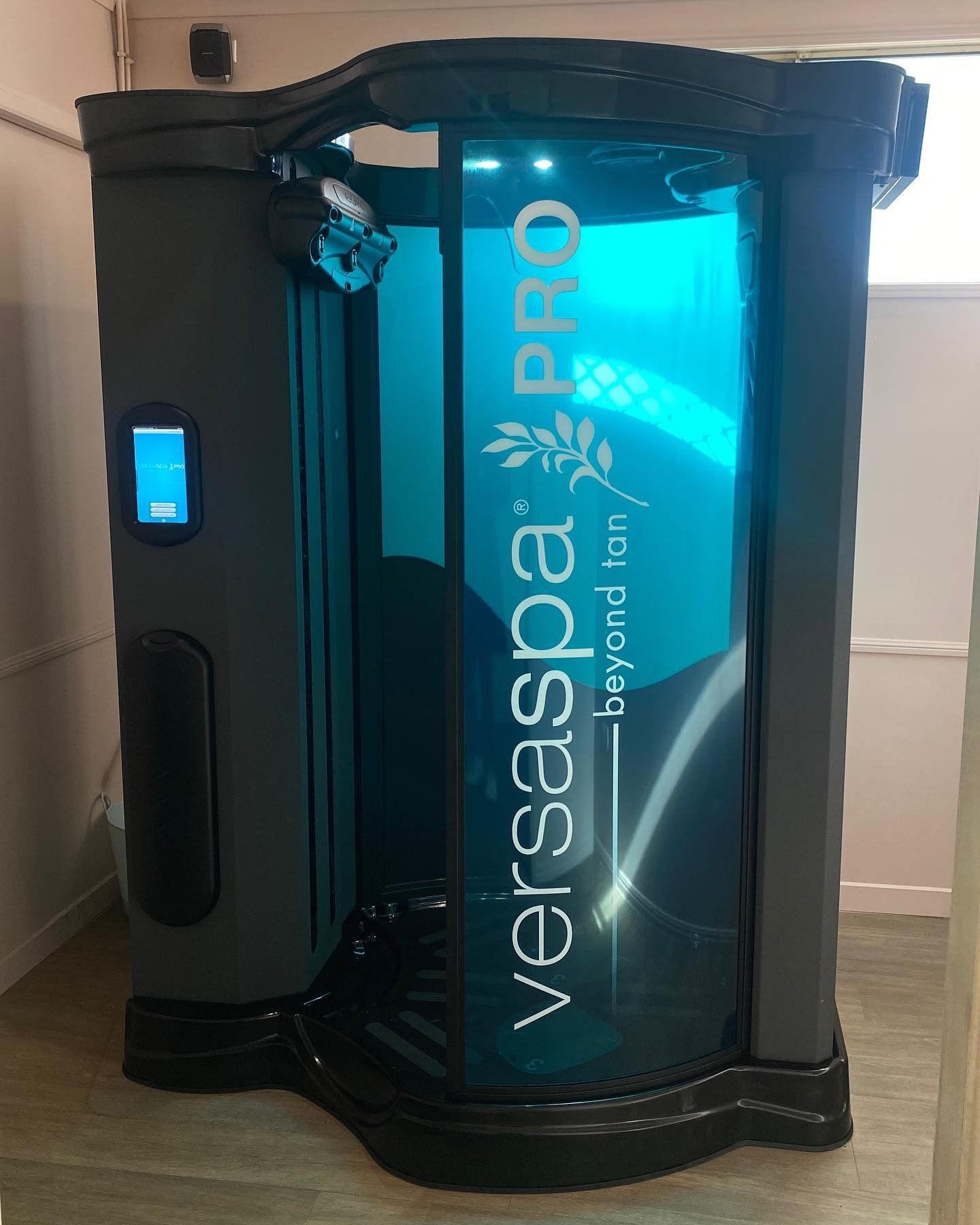 A Versa Spa Pro Tanning Booth is Sitting in a Room — Erikka's All Occasion Beauty In Rockhampton City, QLD