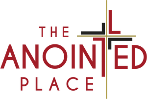 The logo for the anointed place has a cross on it.