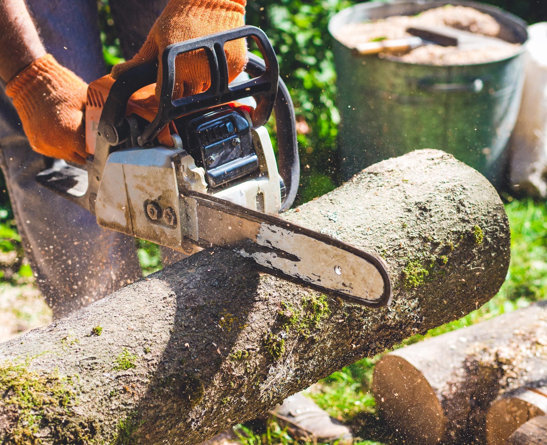 Close up of a chainsaw cutting wood by Lopez Tree Service Corp in Bolingbrook, IL