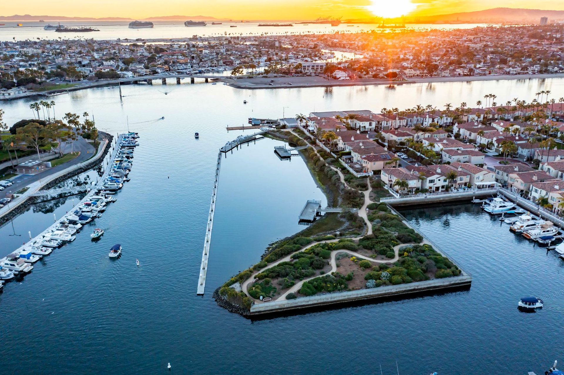 An aerial view of a small island in the middle of a body of water.