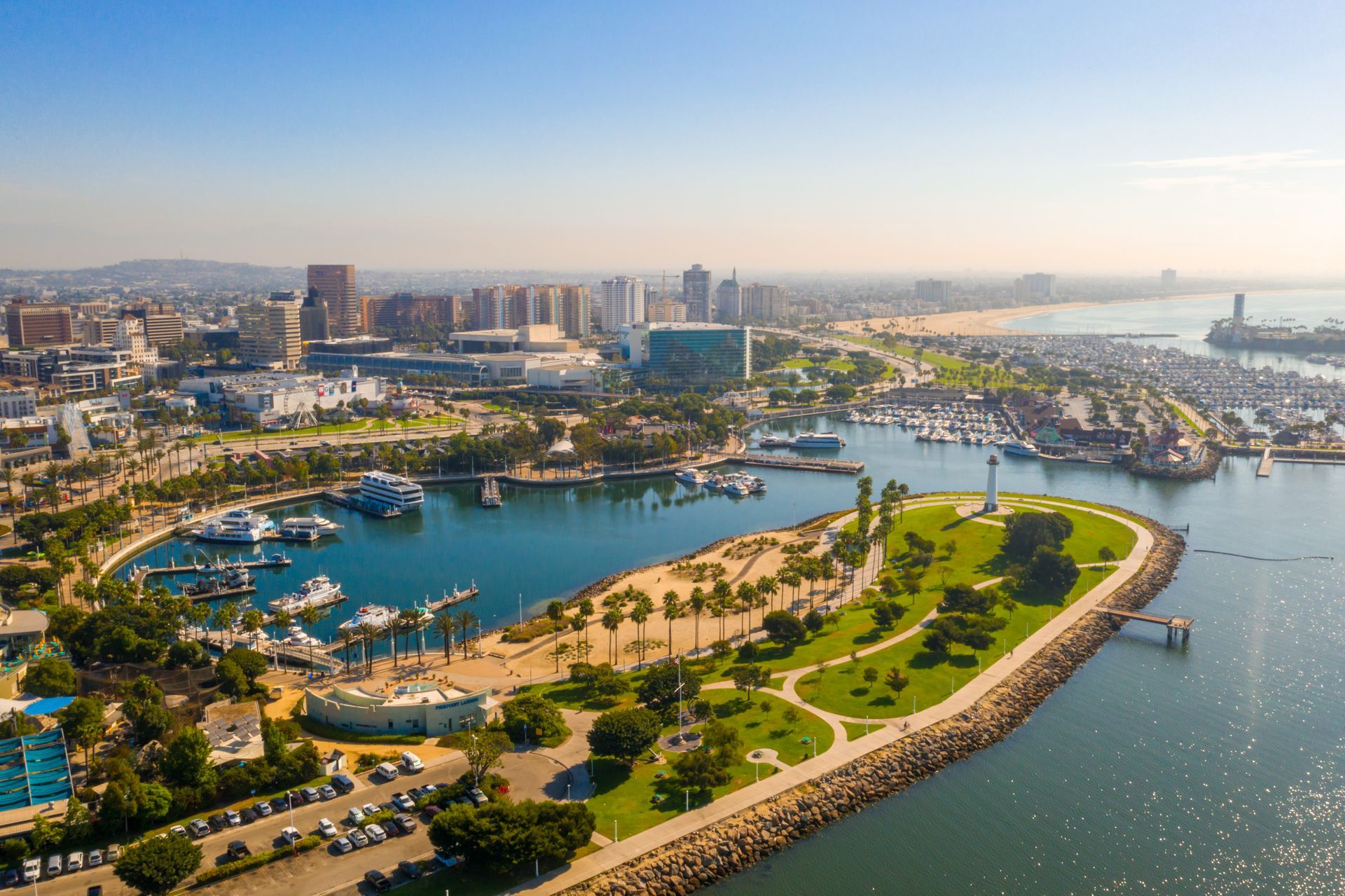 An aerial view of a large body of water with a city in the background.