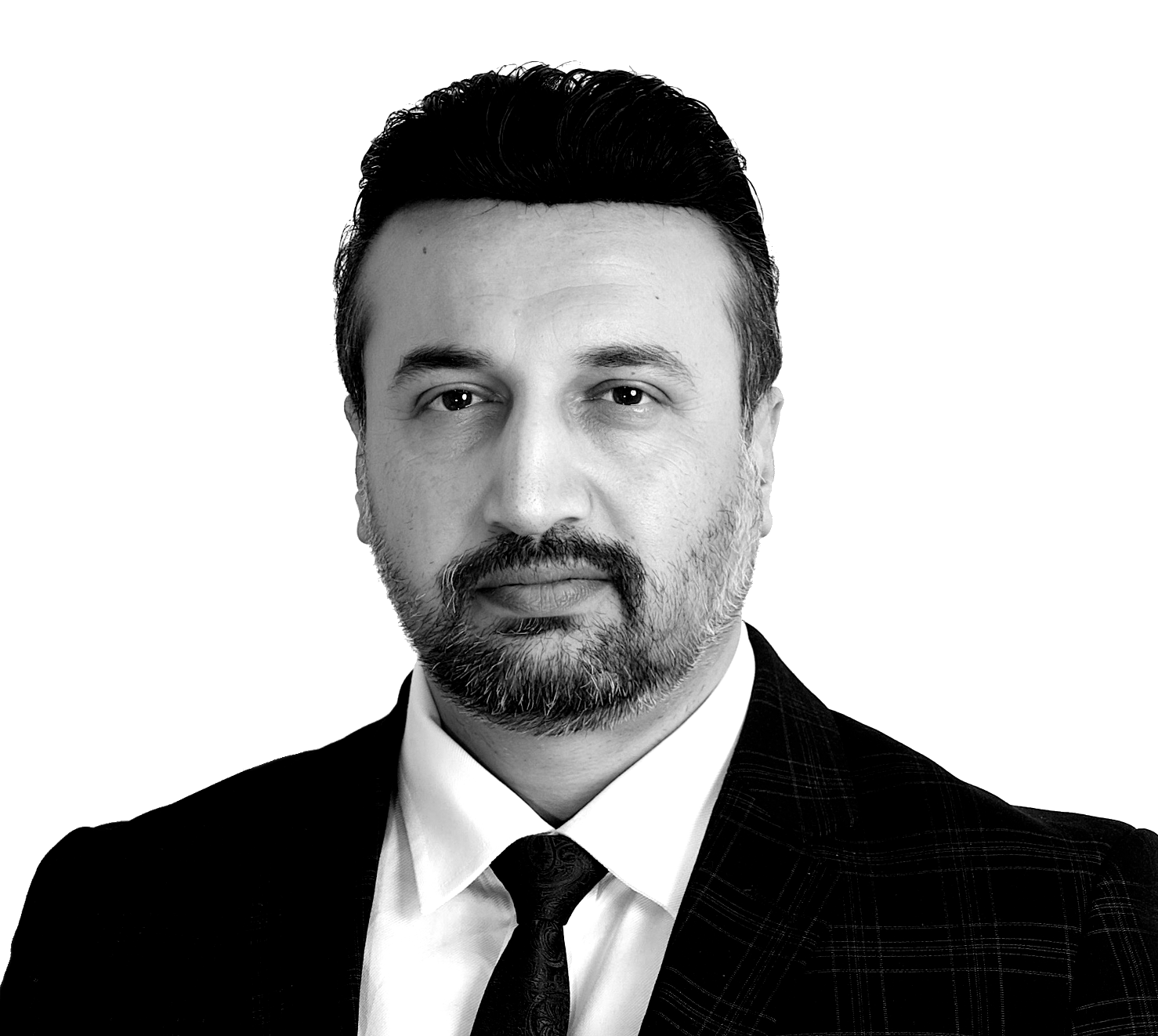 Man in a suit and tie, looking directly at the camera. Black and white portrait.