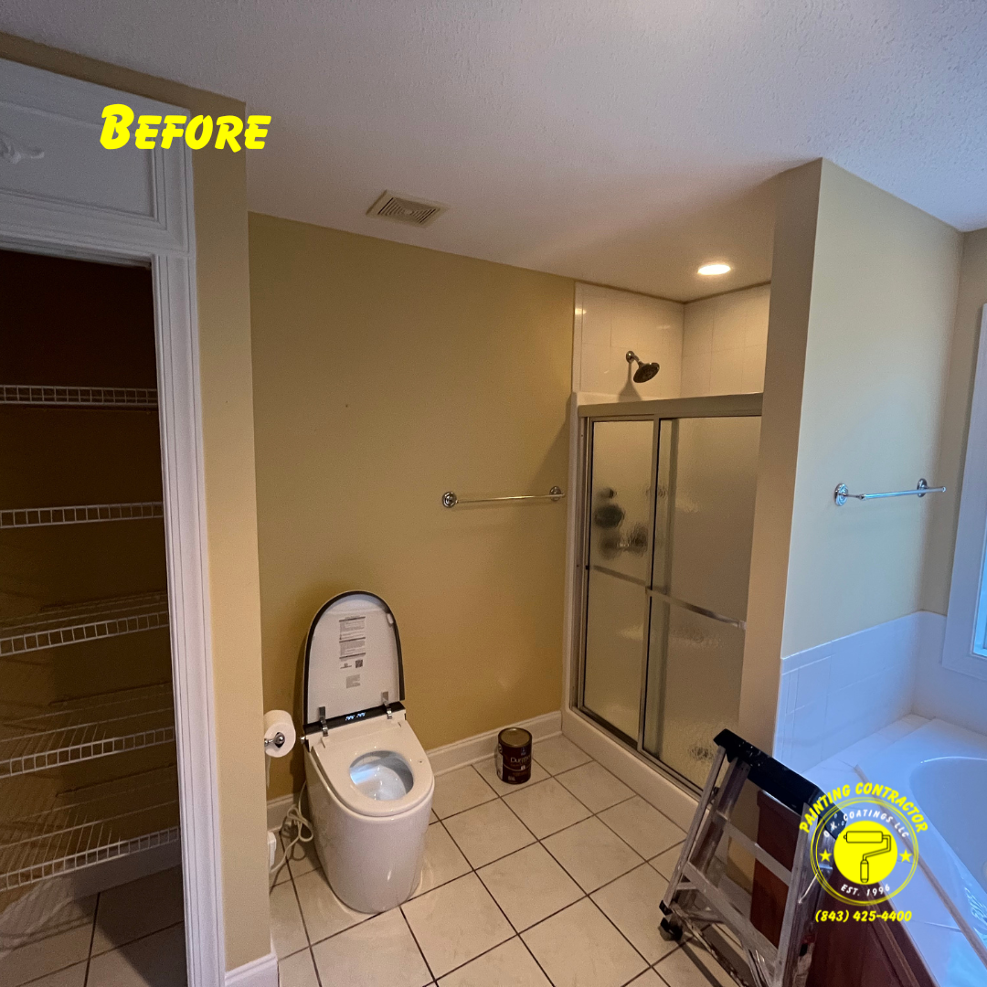 A bathroom with beige walls, a white toilet, a walk-in glass shower, and an open linen closet, labeled 
