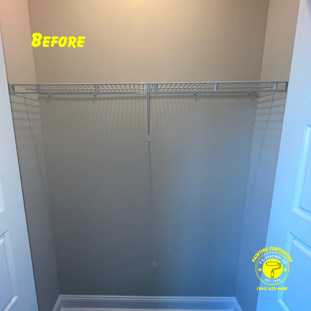 A closet interior featuring gray walls and a single wire shelf mounted horizontally.