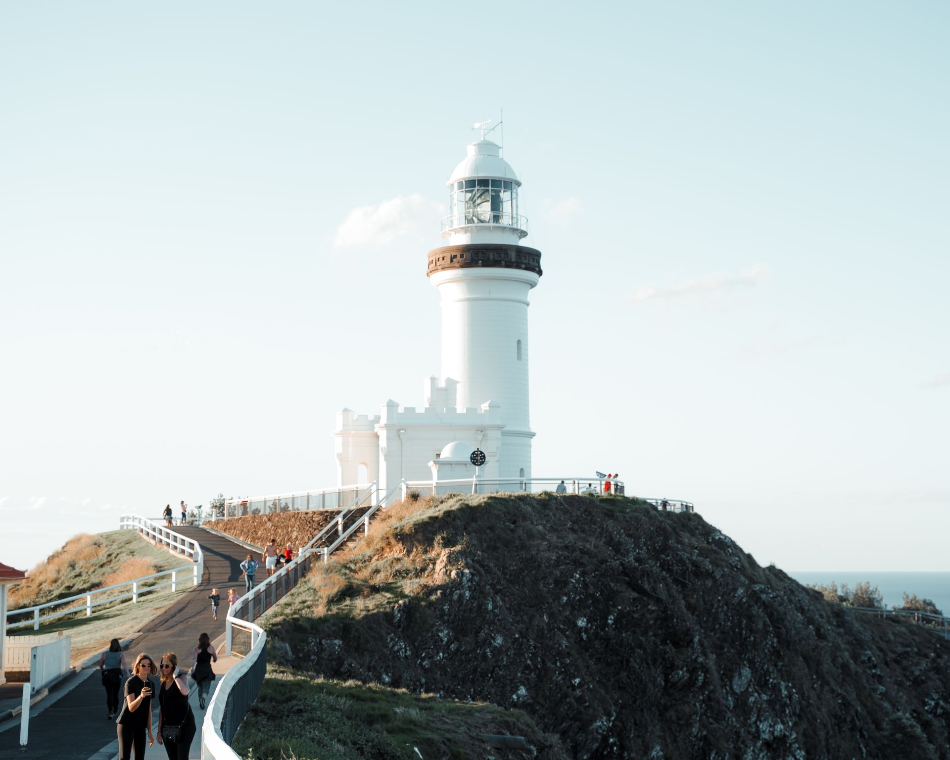 A Woman is Sitting on a Couch Using a Calculator — Rochdale Accounting & Business Advisory in Alstonville, NSW