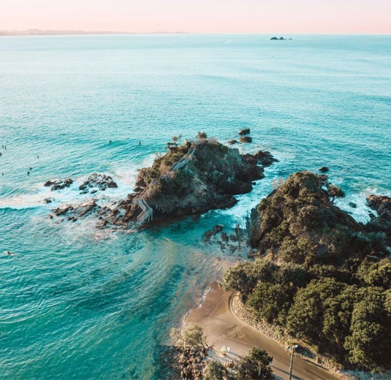 A Man in a White Shirt is Sitting at a Desk With a Computer — Rochdale Accounting & Business Advisory in Alstonville, NSW