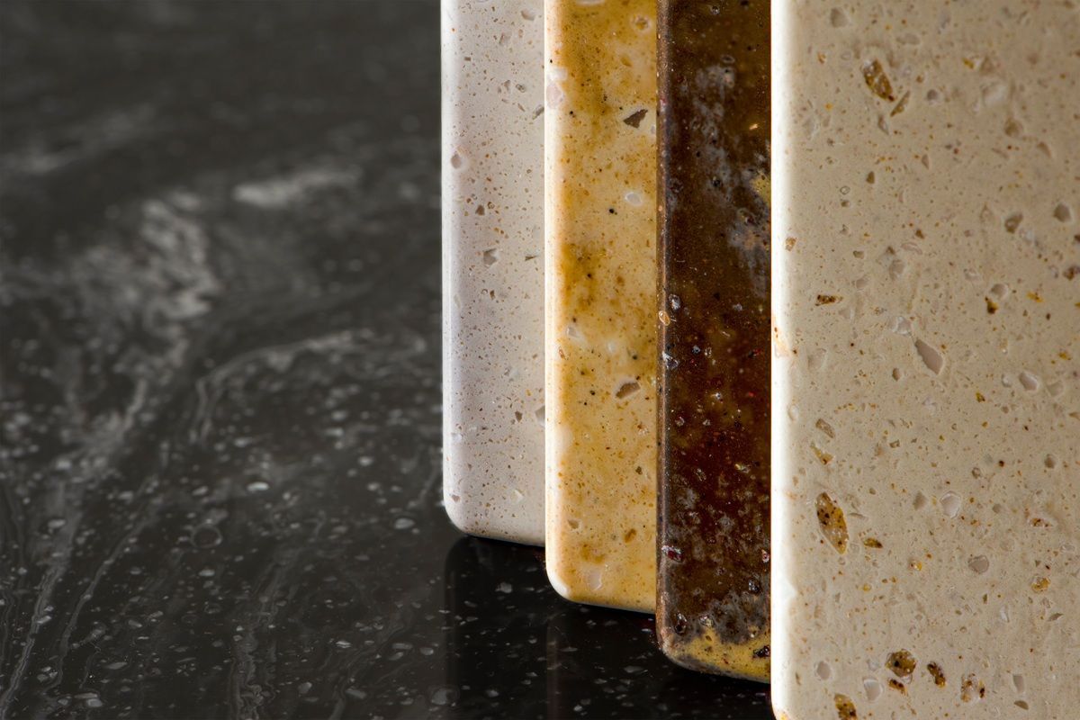 Close-up of a marble surface with brown, beige, and white veining. Close-up of a marble surface with brown, beige, and white veining.