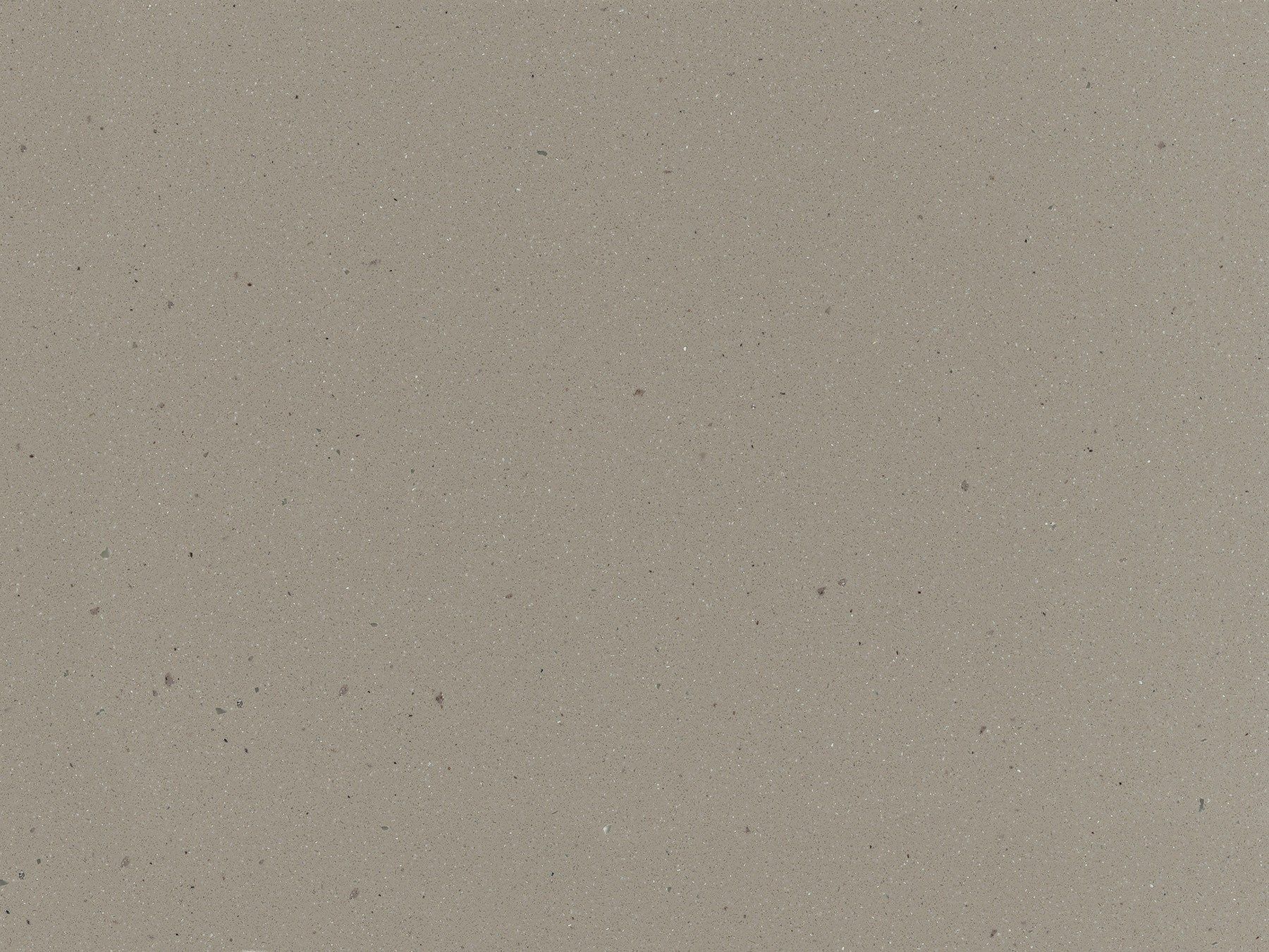 Close-up of a light gray quartz countertop with tiny specks.