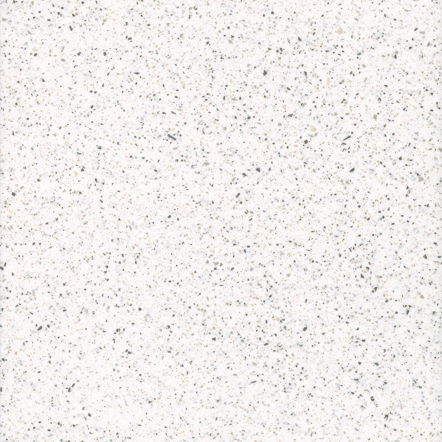 White speckled countertop surface with dark and light flecks.