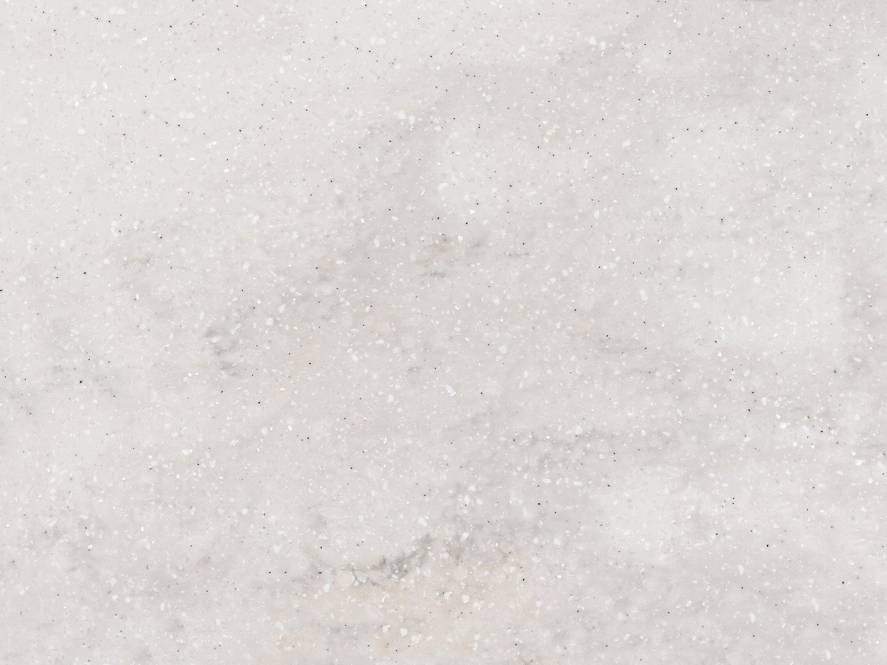 Light gray textured surface with subtle variations and specks.