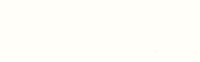 Small, blurred white dot.