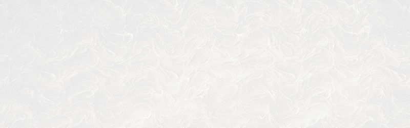 White textured surface with subtle patterns.