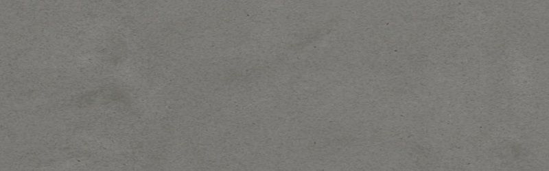 Gray, textured fabric surface with subtle variations in tone.
