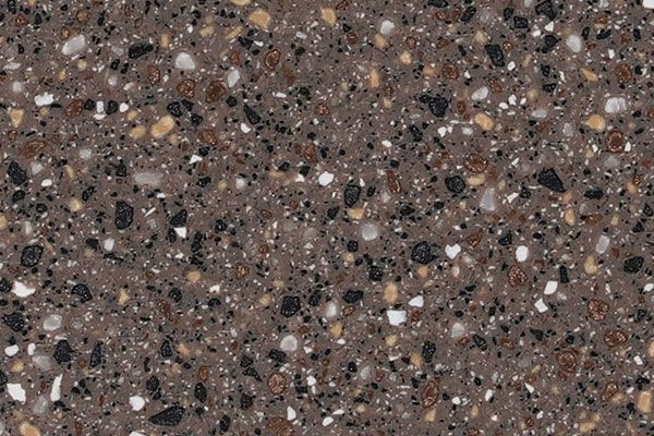 Brown speckled countertop surface with black, white, and tan flecks.