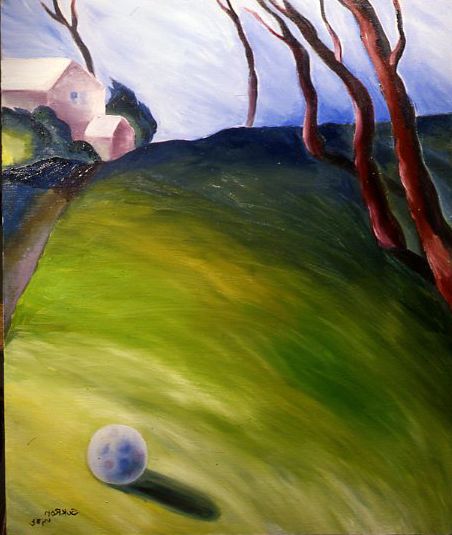 Golf ball on a green hillside with shadow, red trees, and houses in the background