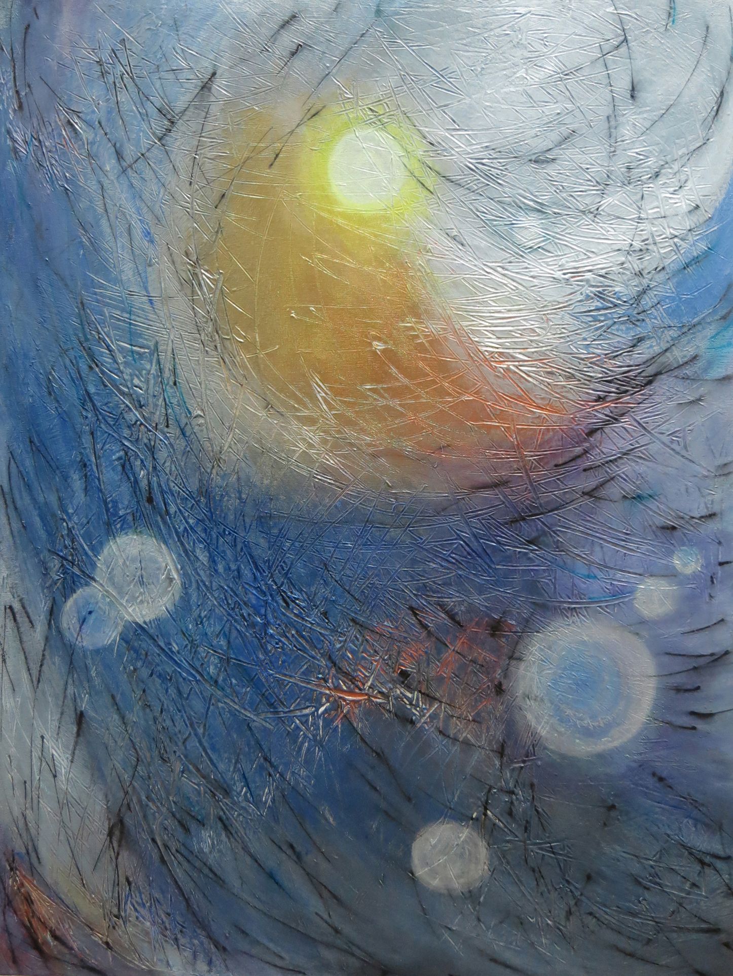 Abstract blue and gray swirls with a glowing yellow-orange center and soft circular light spots