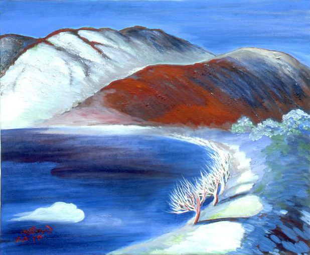 Snowy mountains above a blue bay with a snowy shore and red-brown hillside.