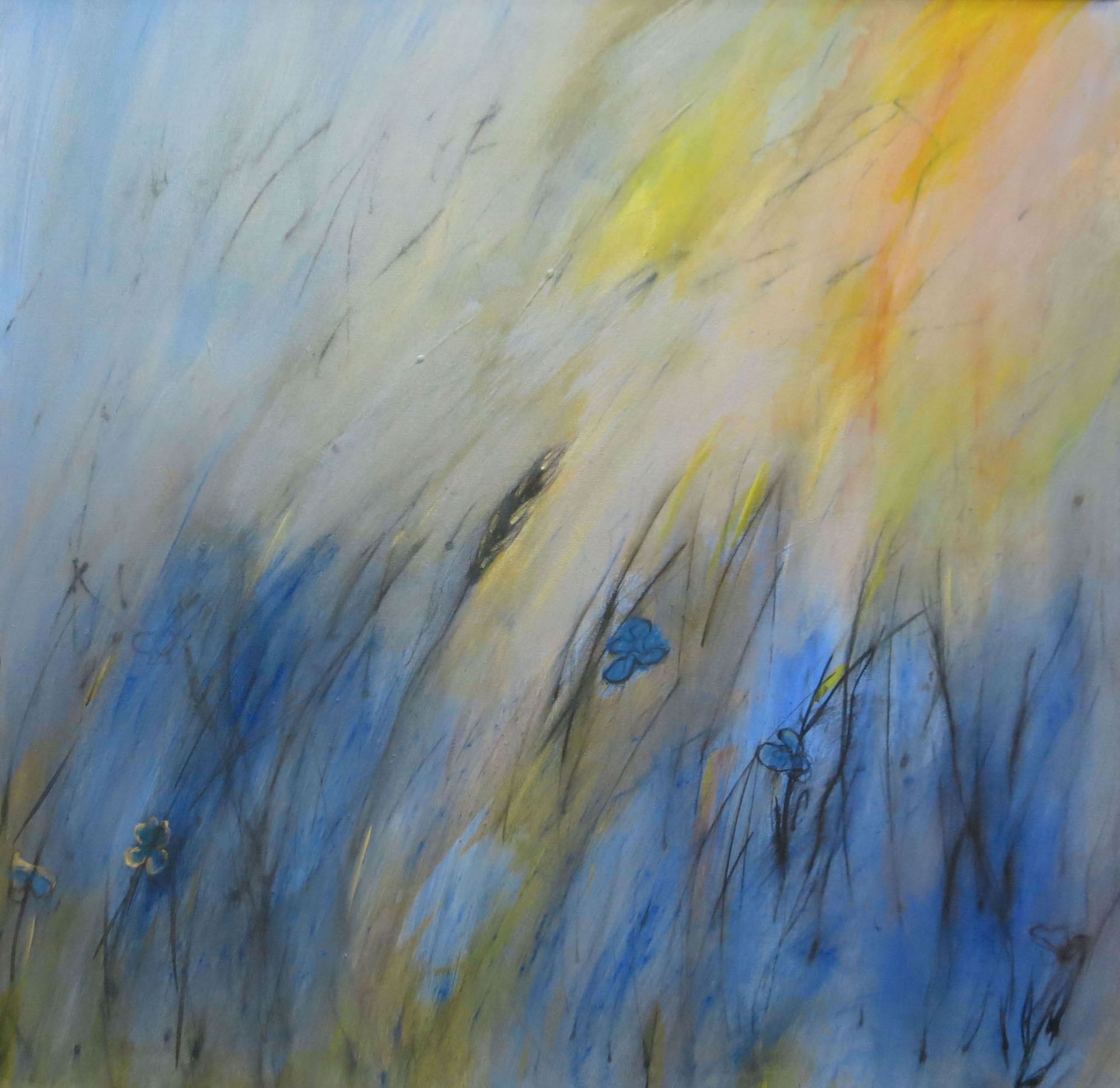 Abstract blue and yellow painting with sweeping streaks and a few small blue floral shapes