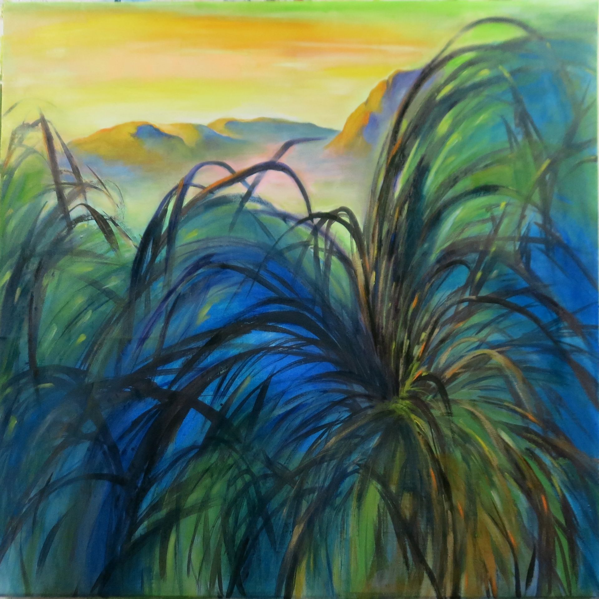 Abstract painting of blue-green grasses against a yellow sky and distant mountains