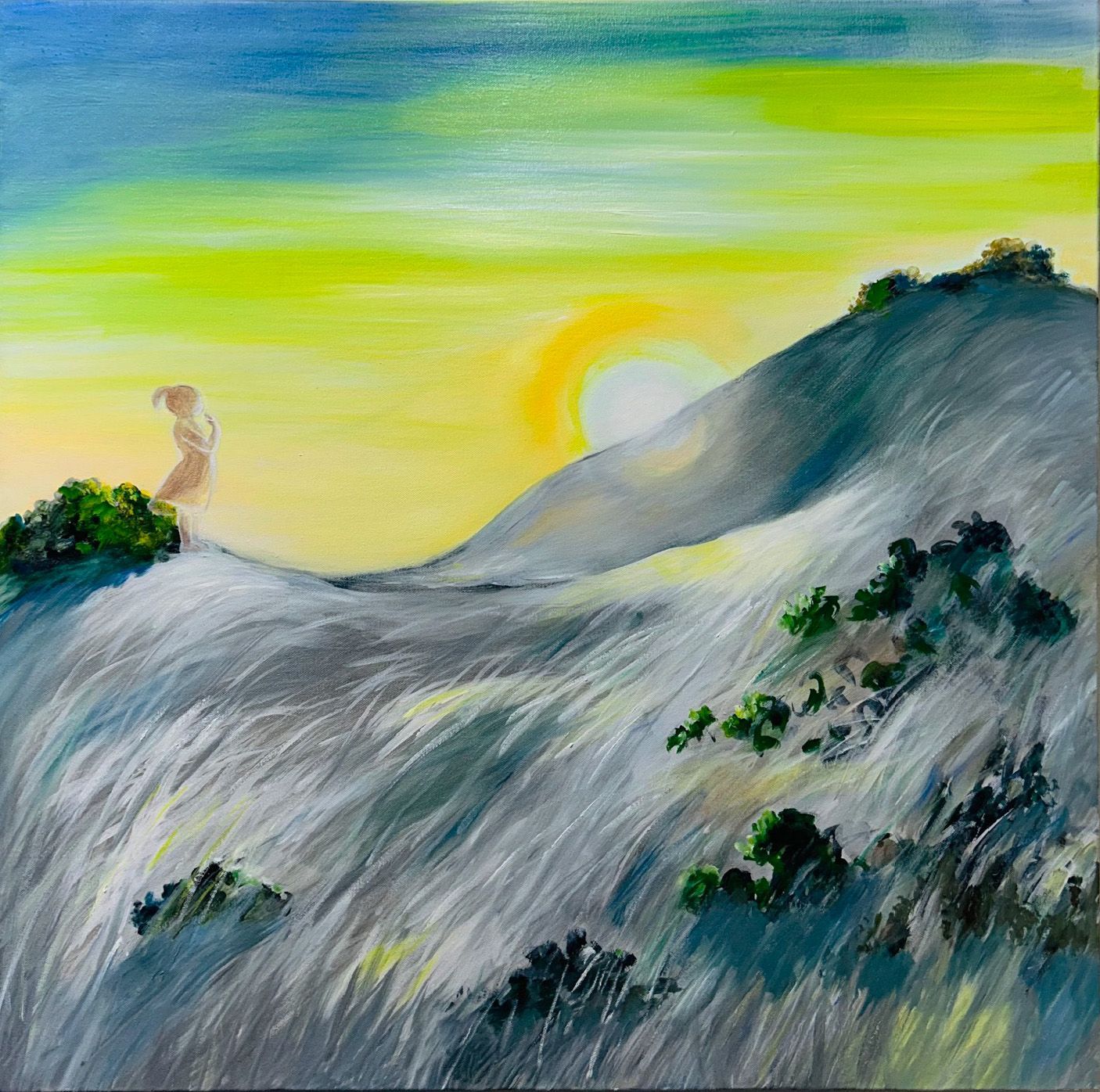 Sunlit snowy hills with dark shrubs under a blue-green sky and rising sun