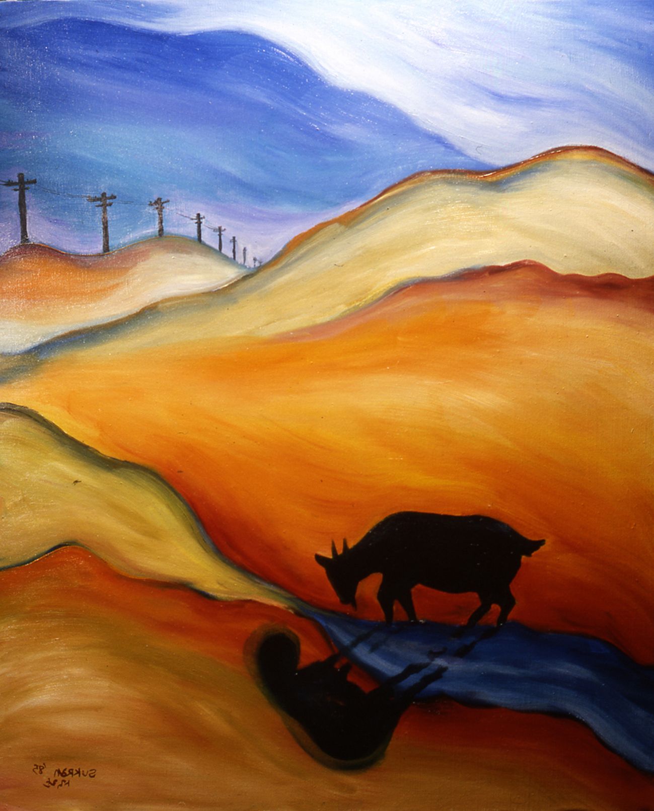 Silhouetted bull on a blue road through orange desert hills under a blue sky