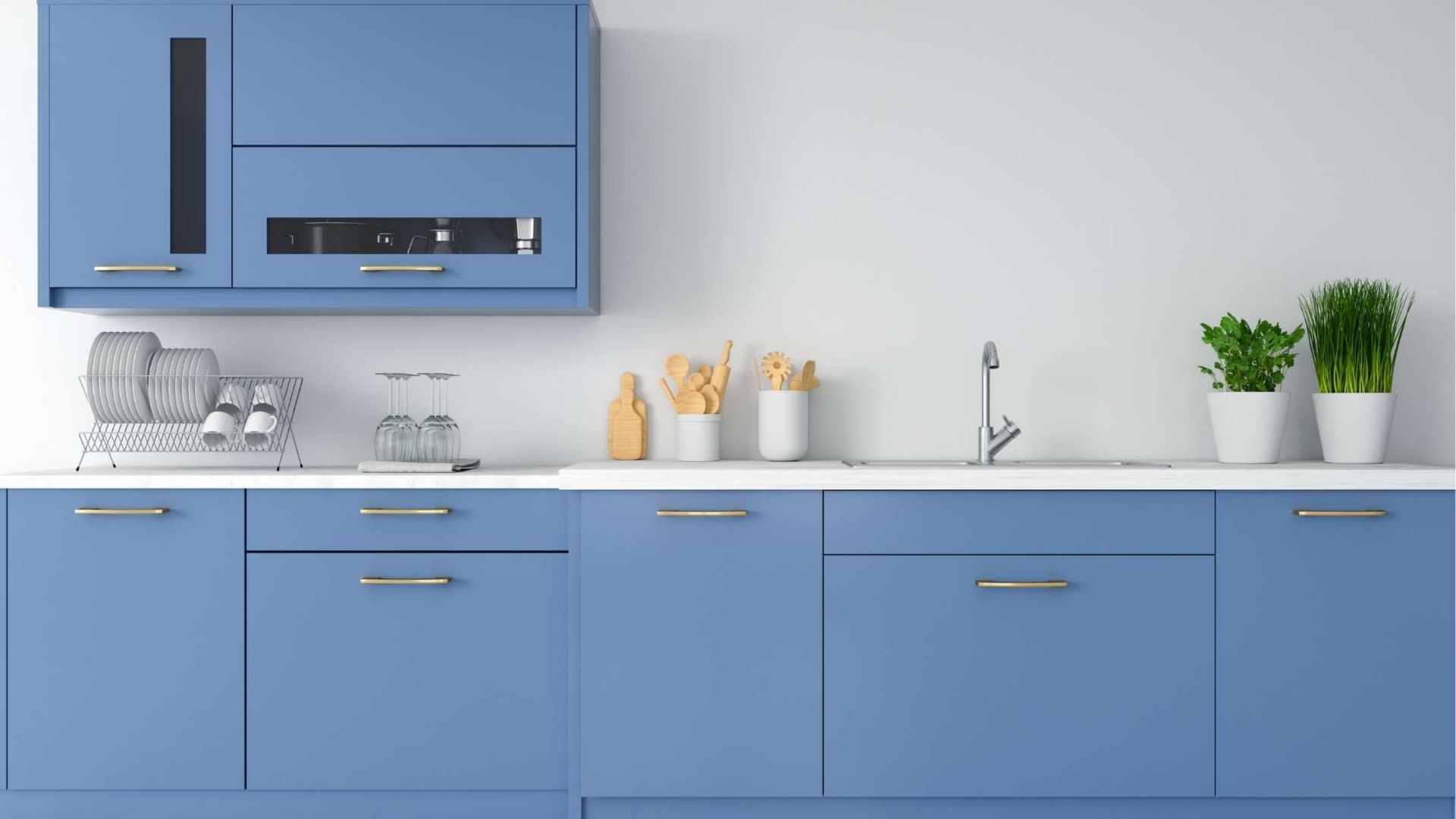 Blue modern kitchen with white countertop, cabinets, sink, and potted plants