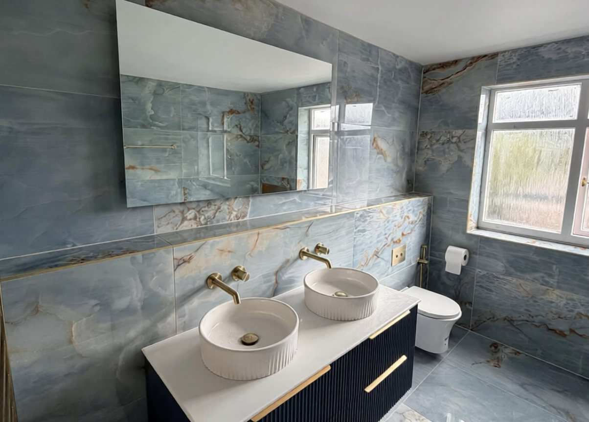 Minimal bathroom wall with black shower fixtures and three white wall caps above a white tub edge