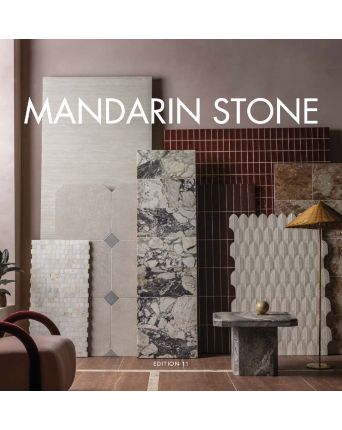 Showroom display of stone tiles and wall panels with “MANDARIN STONE” branding.