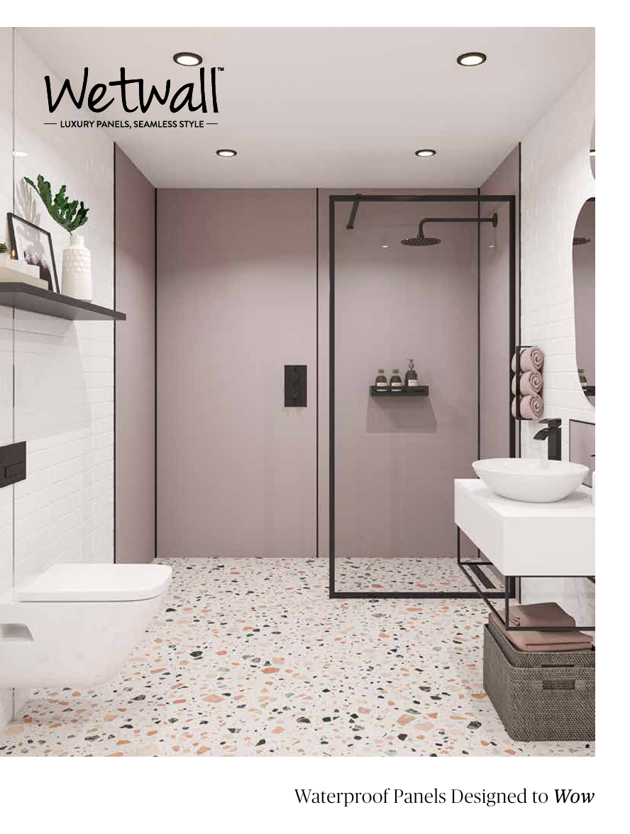 Modern bathroom with terrazzo floor, walk-in shower, vanity, and wall-mounted sink in soft pink tones