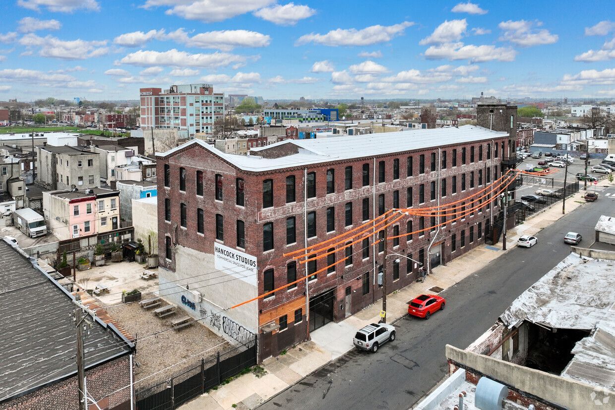 Brick warehouse with courtyard and parking