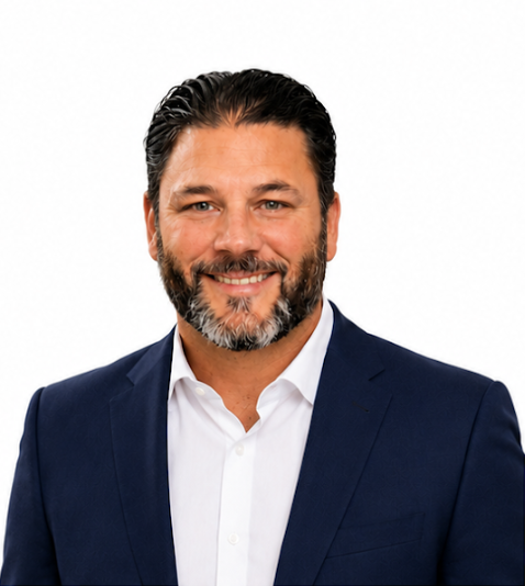 Dave Smiling man in a navy suit and white shirt against a white background