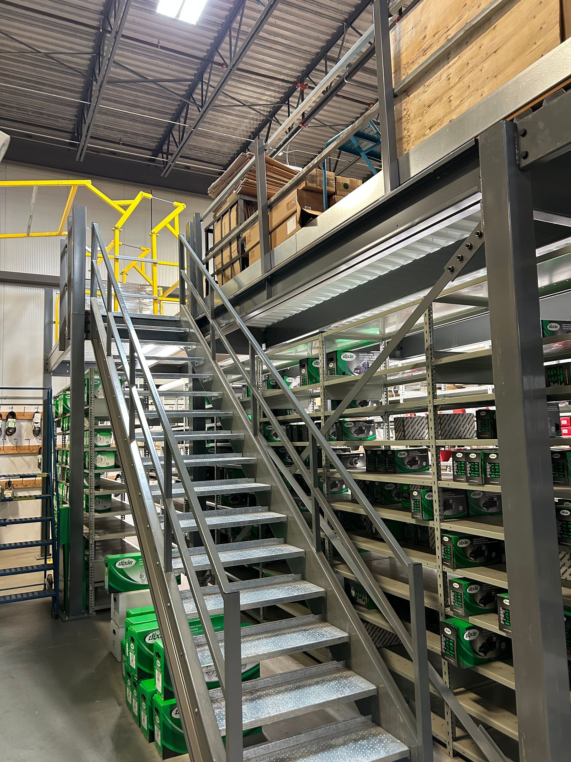 A row of shelves with red drawers between them