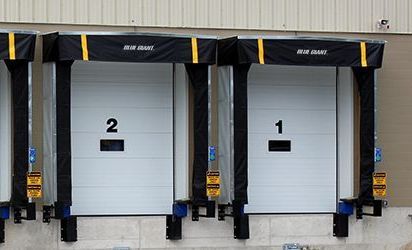 A row of loading docks with the numbers 2 and 1 on them