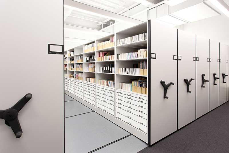 A row of white shelves with the letter y on them
