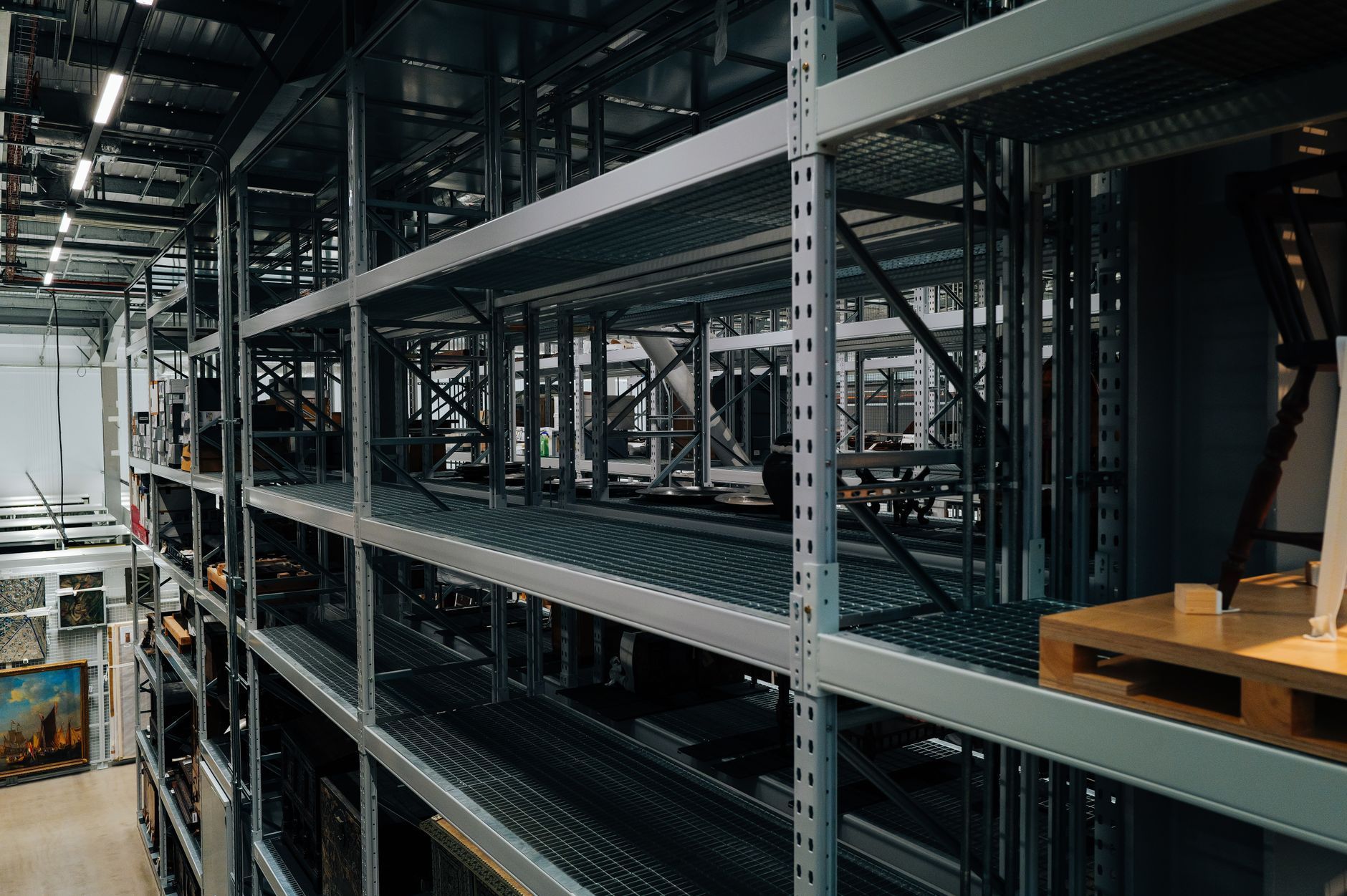 Industrial warehouse with pallet racking and shelving