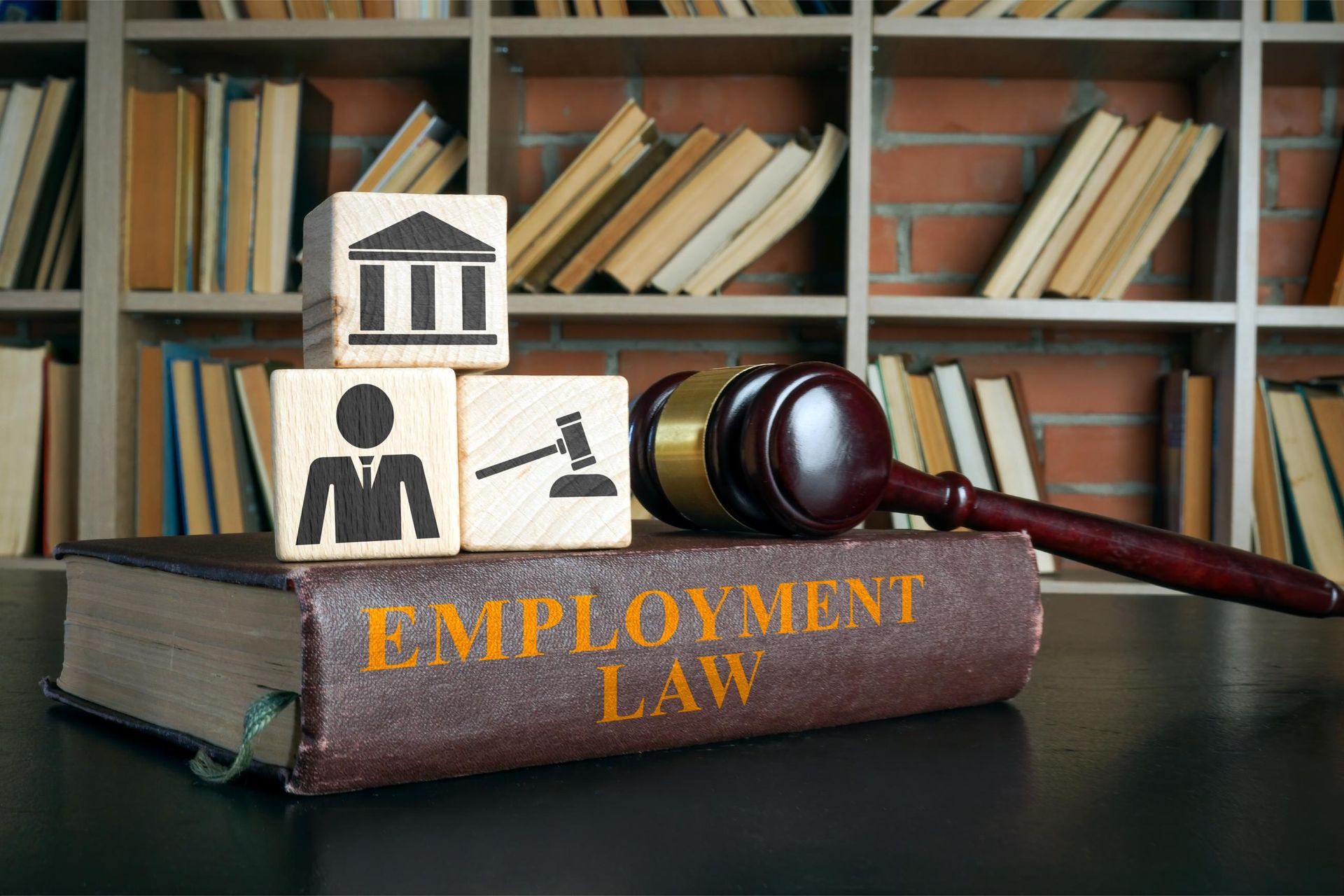 A gavel rests on a book titled