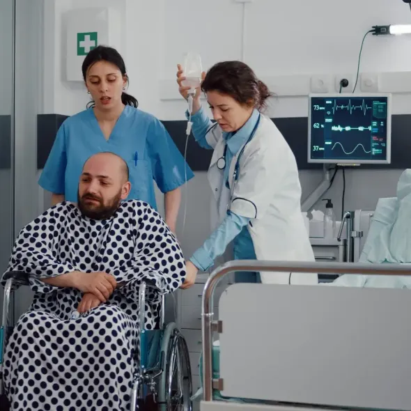 doctor and nurse with a patient in hospital