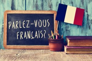 A blackboard with the words parlez-vous francais written on it