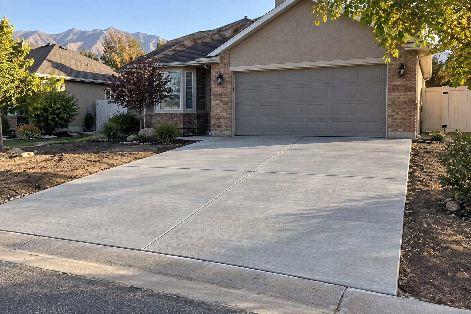 New broom-finish concrete driveway at a home in Salt Lake City, Utah