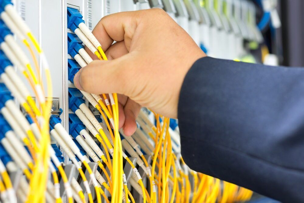 A Person is Working on a Server in a Data Center — DGC Tech Solutions In Mareeba, QLD